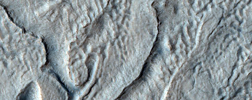 Surface Features around Crater near Hellas Planitia