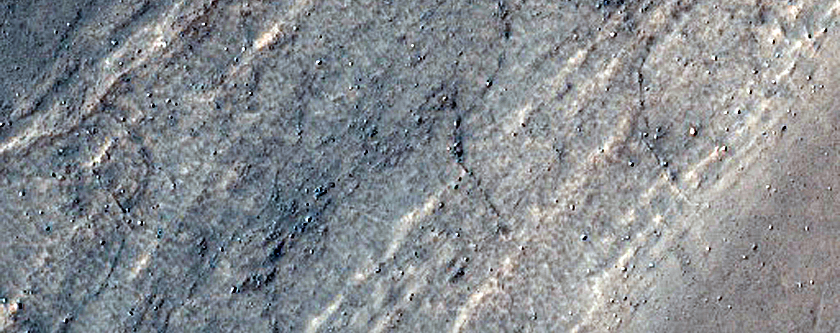 Triangular Scars on Hillslopes