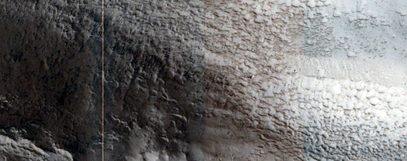 Deeply Incised Channel Breaching Crater Wall