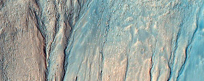Possible Gully-Associated Light Toned Material near Gorgonum Chaos