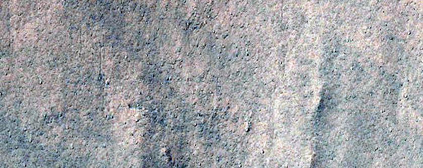 Triangular Scars on Hillslopes