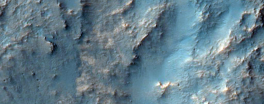 Light-Toned Layered Deposits on Northern Edge of Hellas Planitia