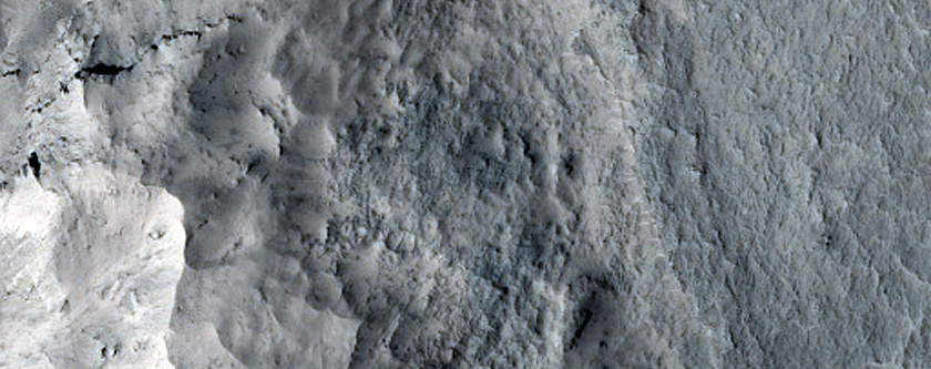 Candidate Fluvial or Lake Sediments in Possible Pollywog Crater at Equator