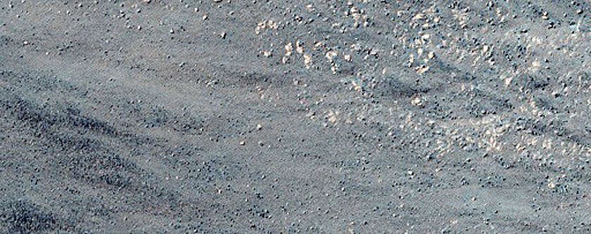 Triangular Scars on Hillslopes