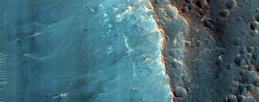 Double Craters with Layering in Wall Exposure