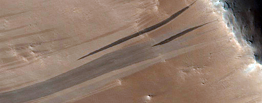 Possible Pyroxene-Rich Material on Arabia Terra Crater Wall
