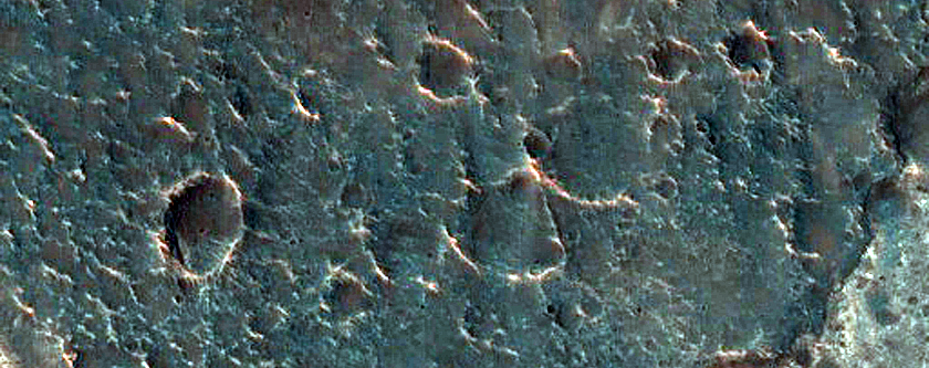 Light-Toned Deposits on Plains South of Coprates Chasma