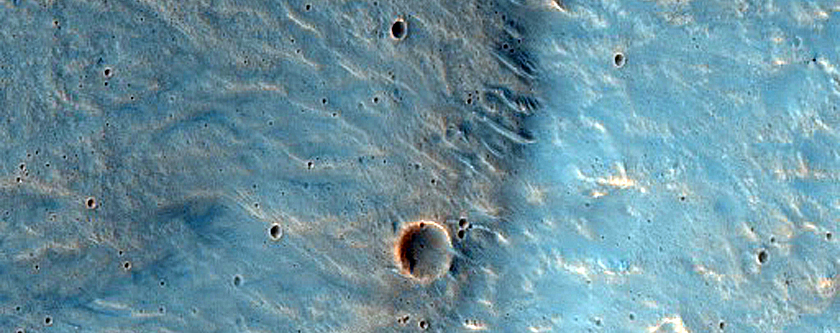 Impact Related Deposits and Flows near Hadriacus Mons