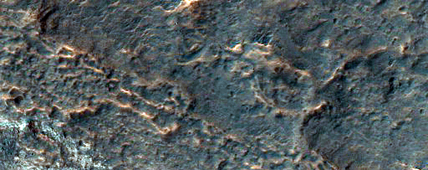 Light-Toned Layered Deposits on Northern Edge of Hellas Planitia