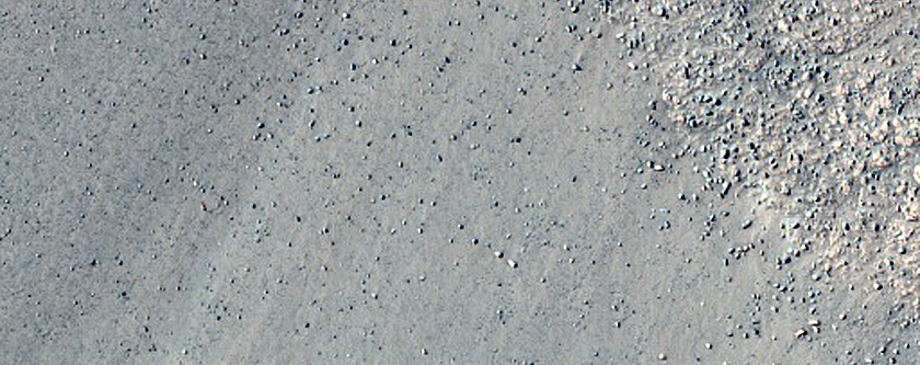 Triangular Scars on Hillslopes