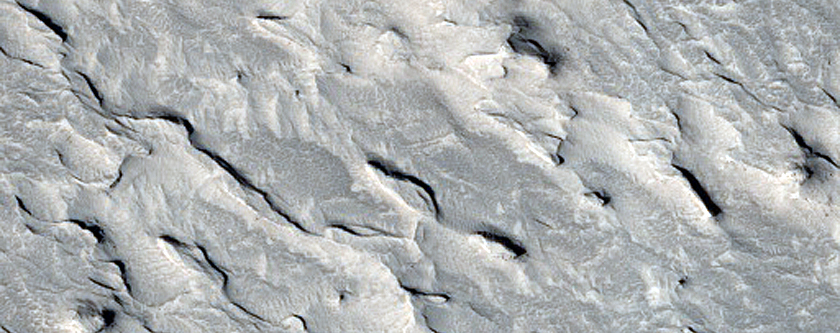 Layers in and around Mesa in Aeolis Planum