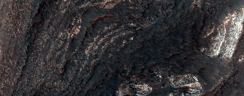 Light-Toned Layered Deposits on Northern Edge of Hellas Planitia