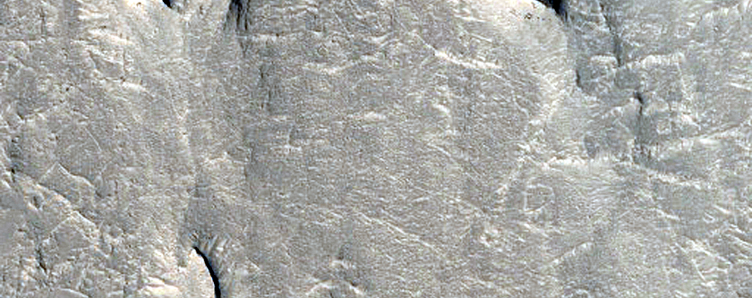 Layers and Yardangs East of Wien Crater