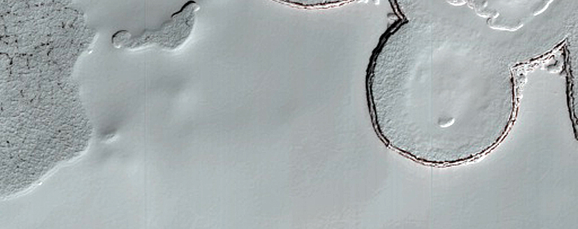 Possible Water Ice and Mesas