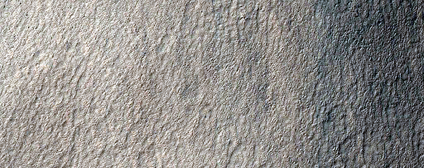 Triangular Scars on Hillslopes