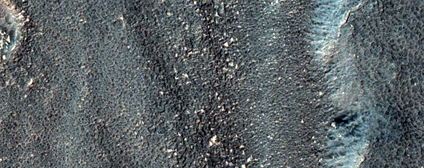 Channel Cutting Wrinkle Ridge in Promethei Terra