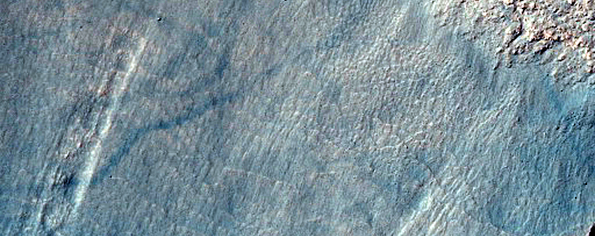 Triangular Scars on Hillslopes