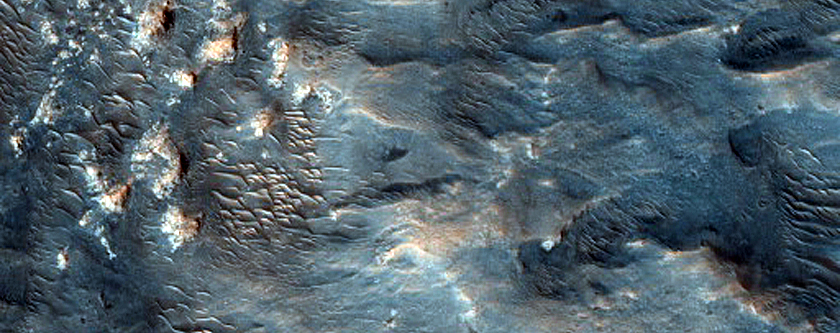 Light-Toned Rock Outcrops and Other Features in Libya Montes