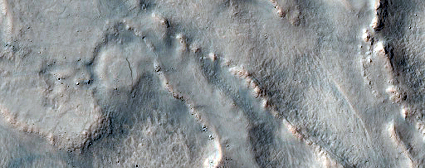 Irregular Cellular Structures on Crater Floor East of Icaria Fossae