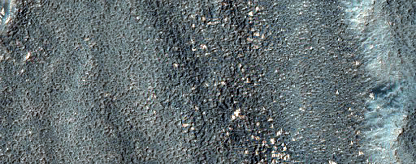 Channel Cutting Wrinkle Ridge in Promethei Terra