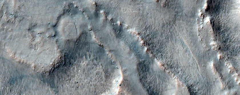 Irregular Cellular Structures on Crater Floor East of Icaria Fossae
