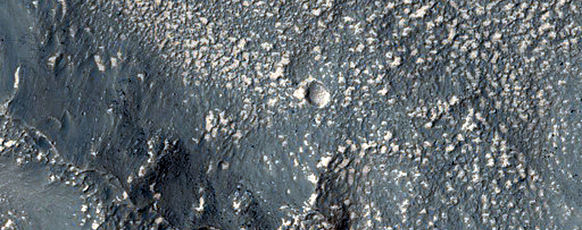 Dark Outcrop in Eastern Hellas Montes