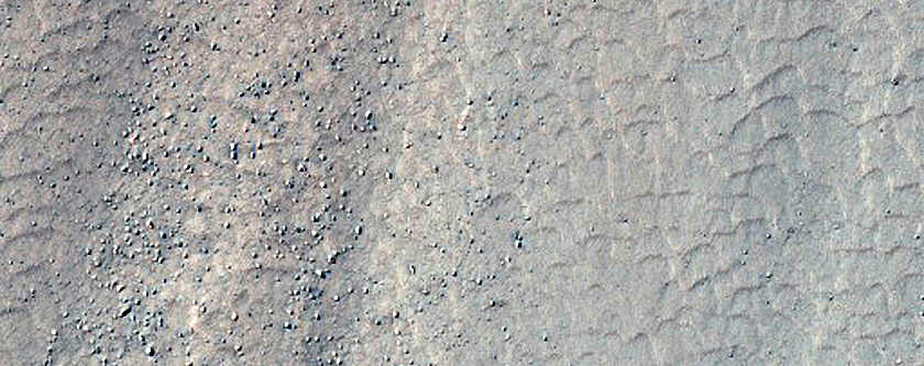 Triangular Scars on Hillslopes