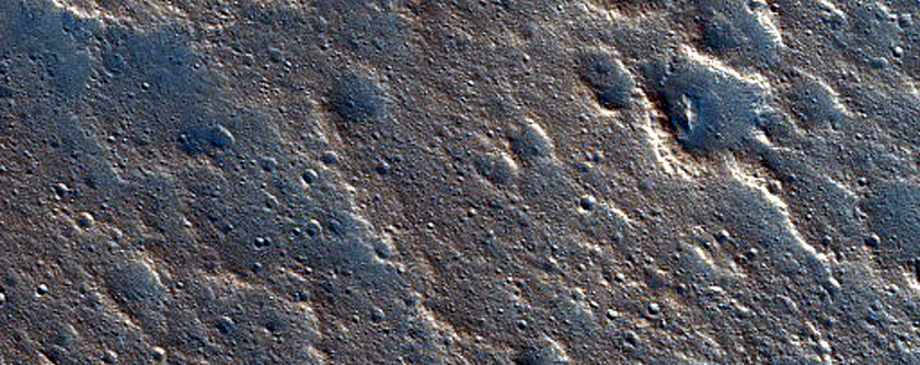 Layers around Crater in Kasei Valles