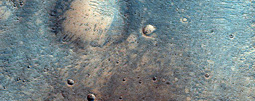 Small Fans and Narrow Channels in Crater Interior in Xanthe Terra