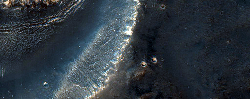 Channel Cutting Small Southern Mid-Latitude Crater