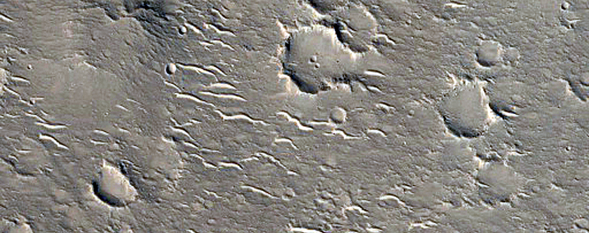 Arcuate Ridges and Pitted Cones near Hebrus Valles