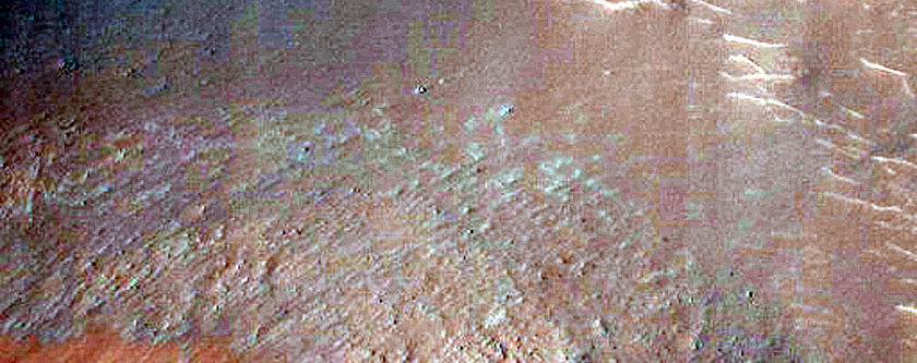 Possible Topographic Slumps in Eos Chasma