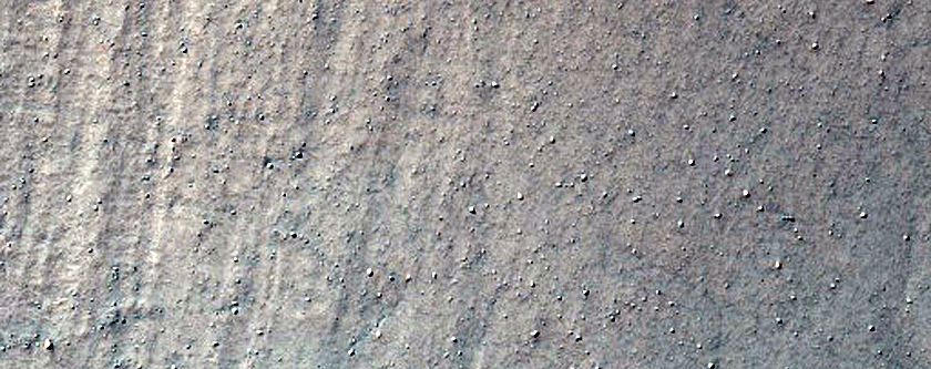 Triangular Scars on Hillslopes