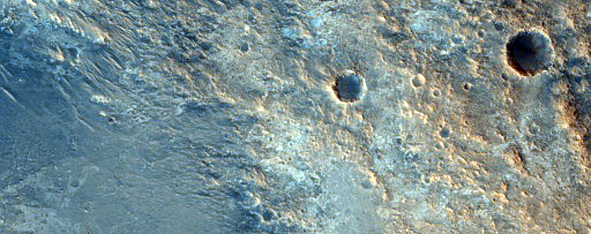 Crater with Eroded Layered Ejecta