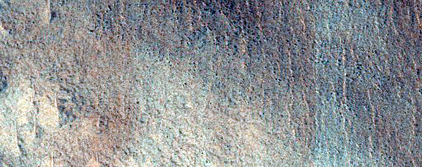 Layered Features in Craters in Northern Plains