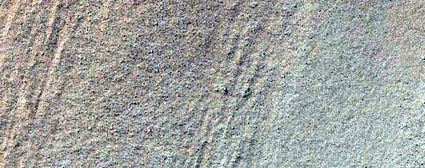 Triangular Scars on Hillslopes