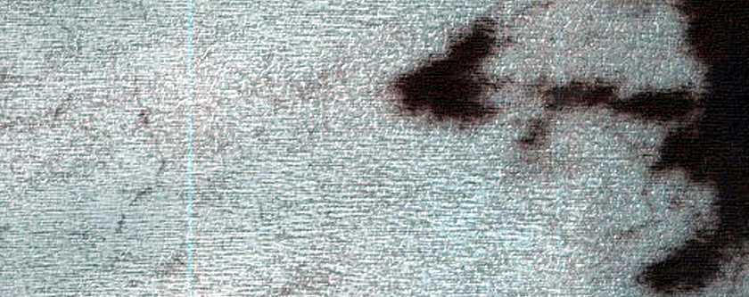 Pit Site near Massive Carbon Dioxide Ice