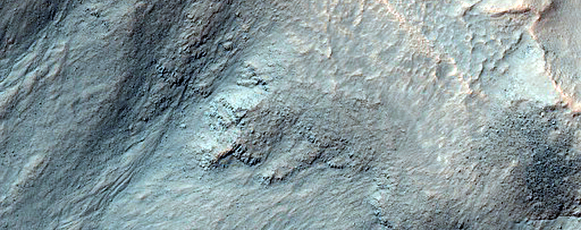 Possible Gully Associated Light-Toned Materials near Istok Crater