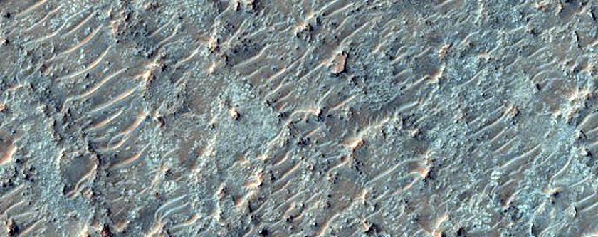 Olivine-Bearing Materials in Southern Huygens Crater