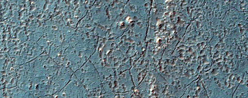 Small Crater North of Argyre Region Filled with Ejecta from Hale Crater