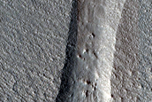 Morphologically Fresh Incision in Potentially Ice-Rich Mantling Deposit