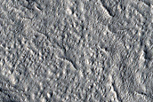 North-Pole-Facing Deposit in Crater Associated with Headwall Erosion