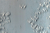 Candidate Recent Impact Site in Wall of Ius Chasma