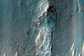 Diverse Bedrock Exposure Beneath Extensive Clay Unit in Her Desher Vallis