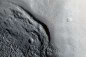 North-Pole-Facing Deposit in Crater Associated with Headwall Erosion