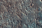 Mafic Mineral Exposures in Antoniadi Crater Basin