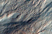 Monitor Steep Slopes of Asimov Crater