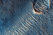 Layers Exposed around Streamlined Feature in Ares Valles