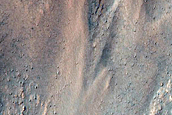Triangular Scars on Hillslopes