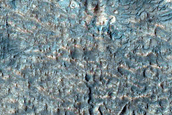 Light-Toned Layered Deposits on Northern Edge of Hellas Planitia